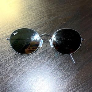 Black, round RayBan sunglasses